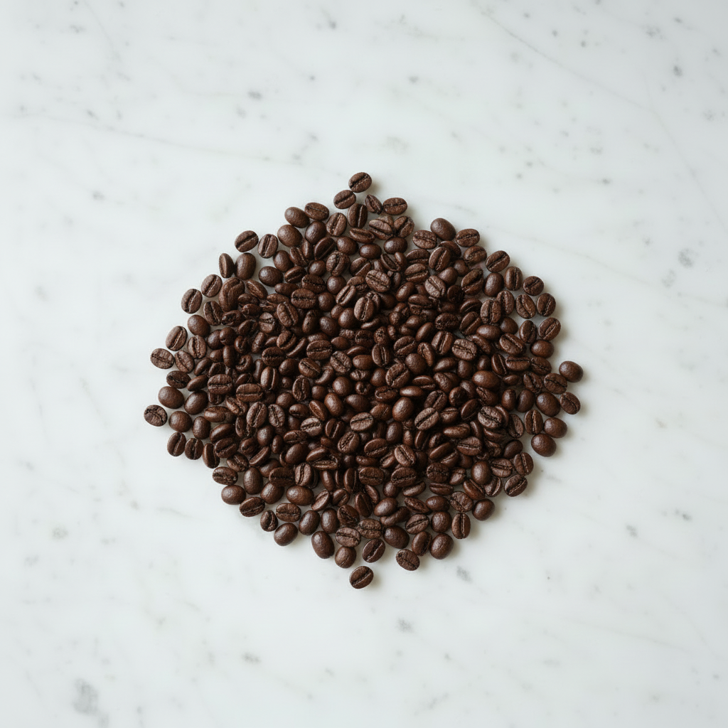 Dark espresso beans on marble