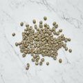 Green coffee beans naturally scattered - moderate amount