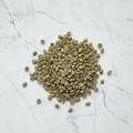 Green coffee beans on marble