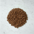 Medium roast coffee beans on marble